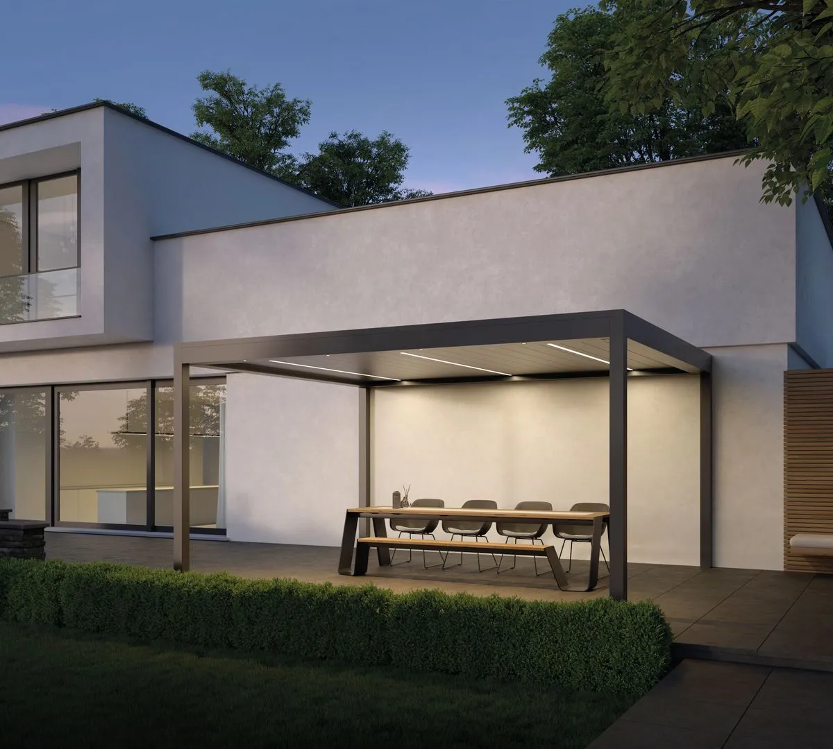 Pergola bioclimatique en aluminium à lames orientables couvrant une terrasse